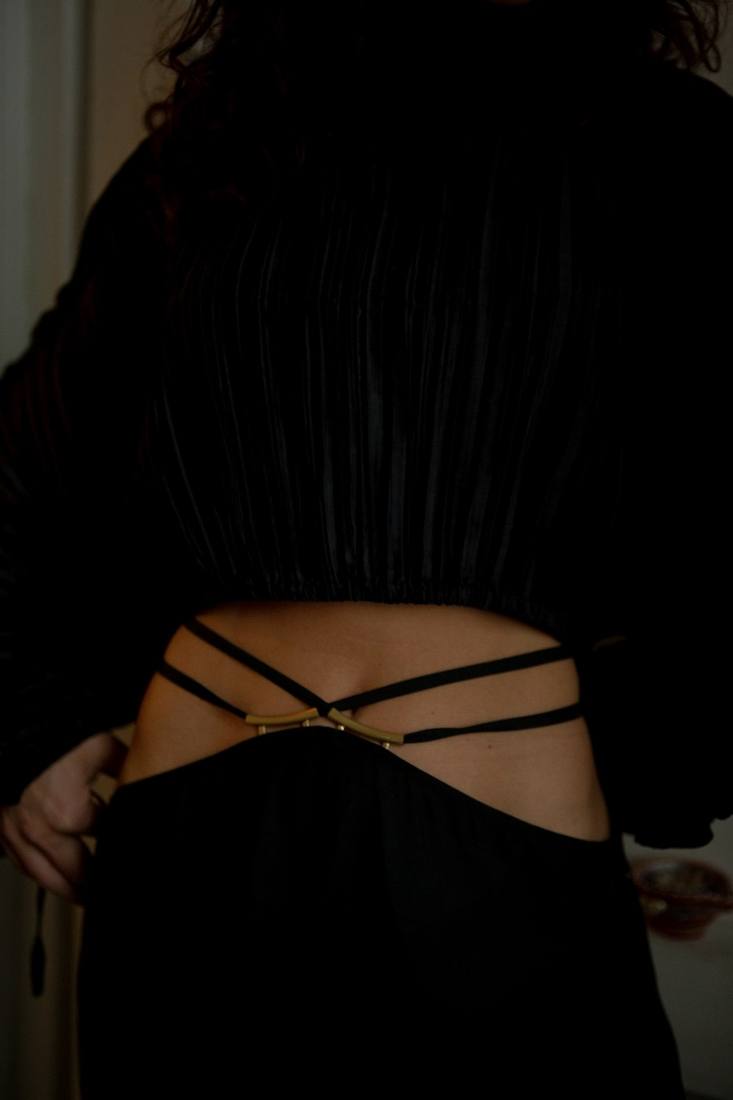 Editorial style — black outfit detail